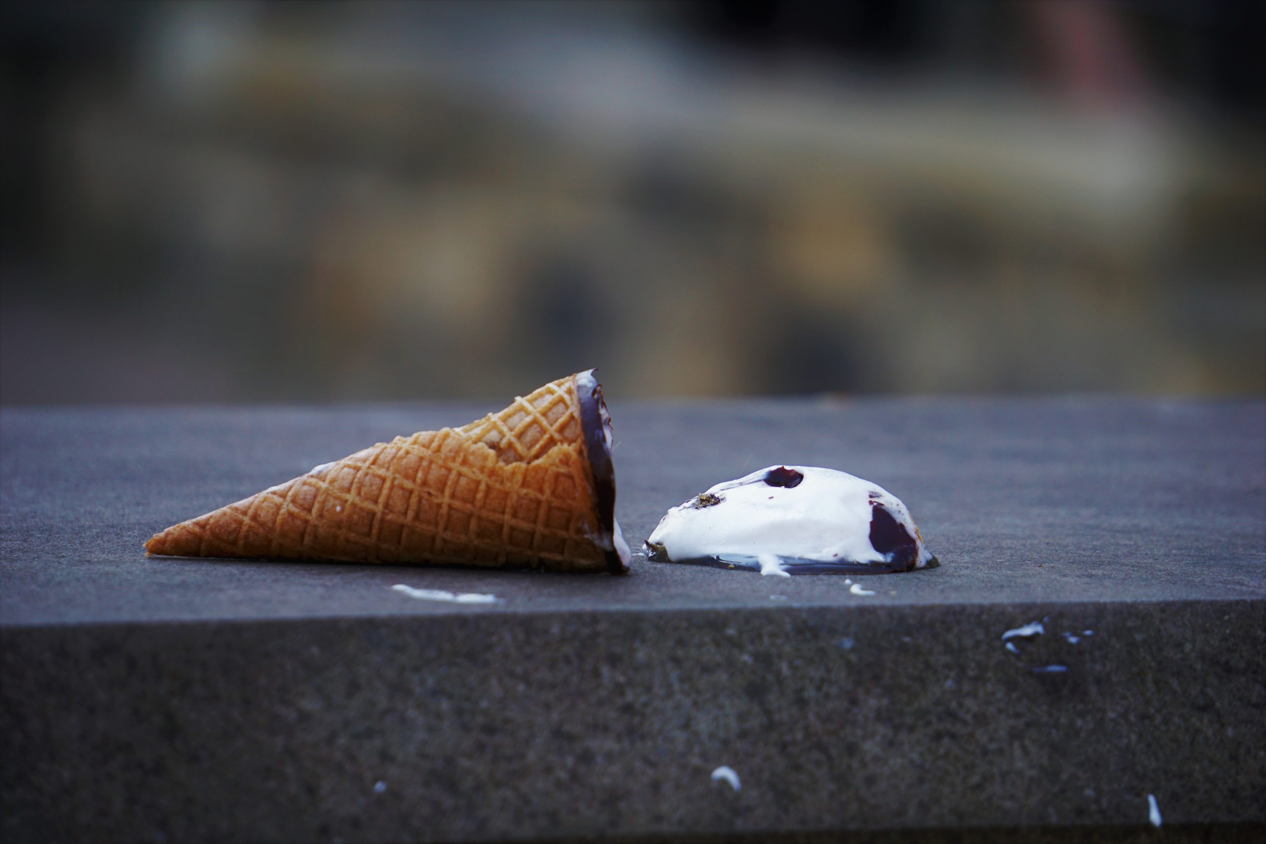 An spilled ice cream cone as an example for out-of-placeness