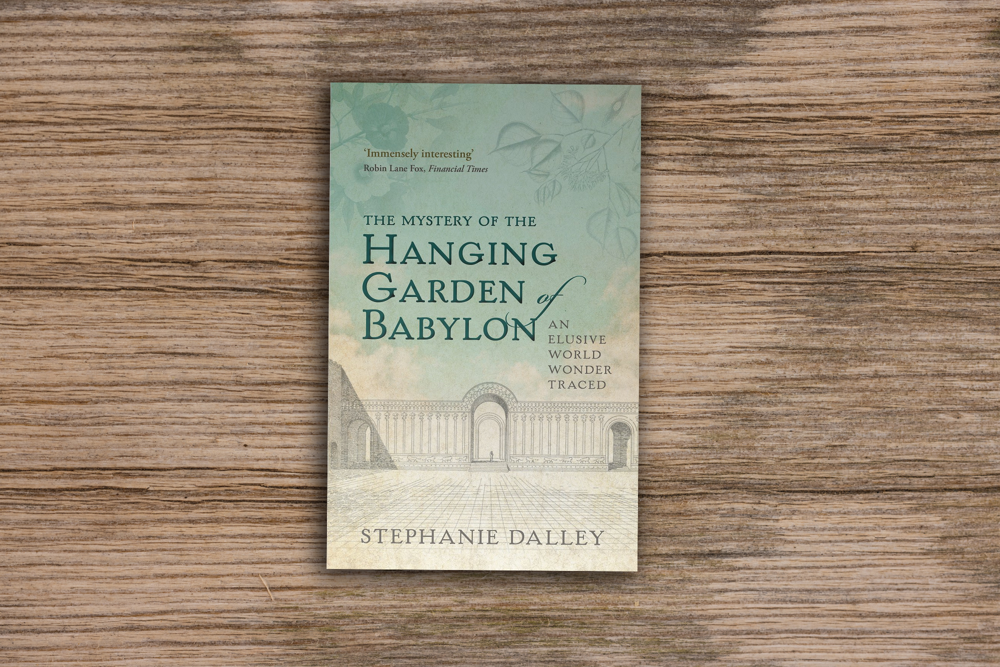 Cover of the book "The mystery of the Hanging Gardens of Babylon" by Stephanie Dalley. Background photo by engin akyurt on Unsplash.