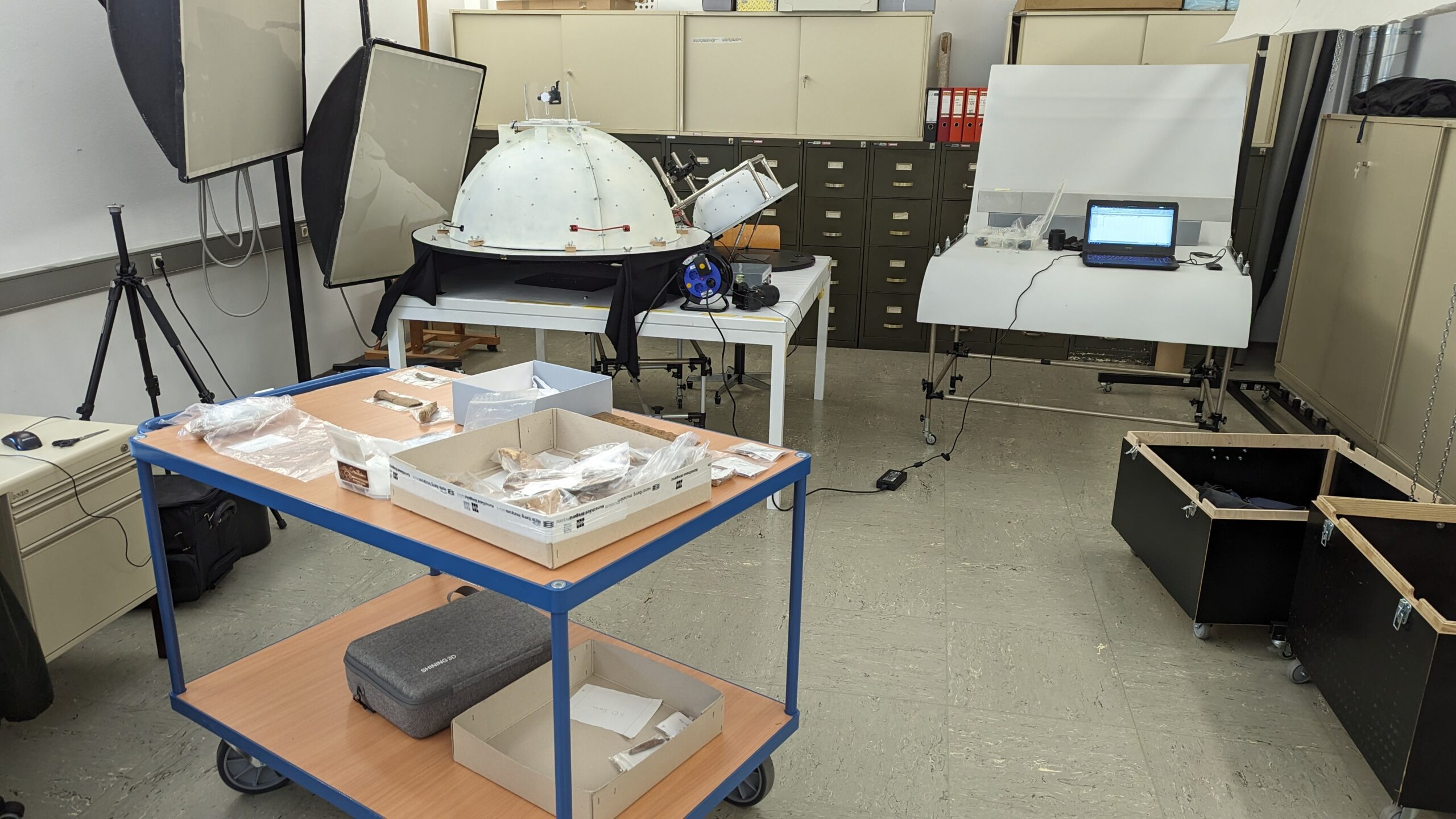 This image shows the place I worked in with a lot of different gear. Foremost, you see two RTI domes that I used for scanning.