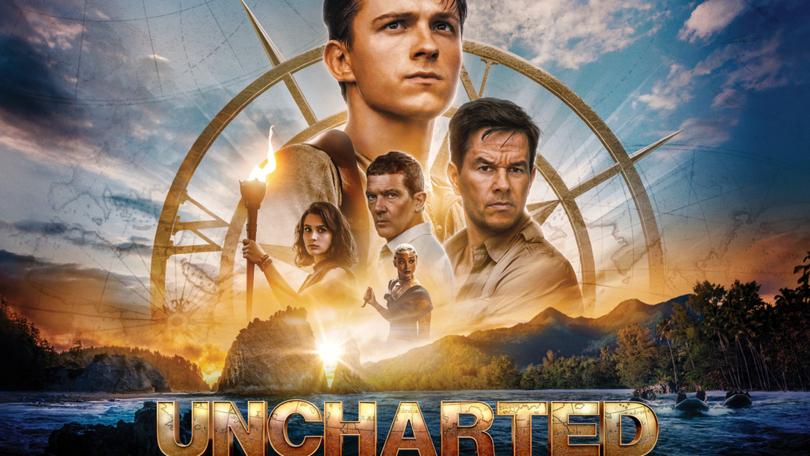 The film poster of the Uncharted movie showing the main characters.